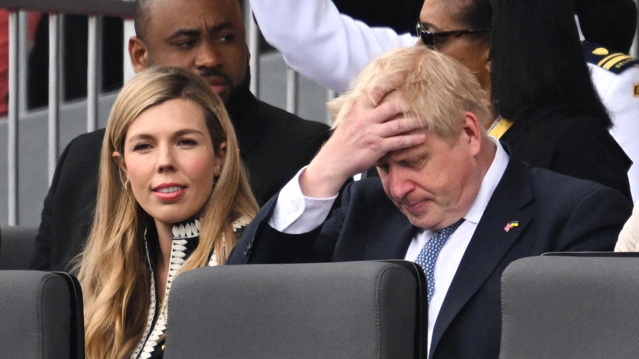 Britain's Prime Minister Boris Johnson and his wife Carrie react during the Platinum Pageant in London. Picture: Leon Neal / Pool / AFP