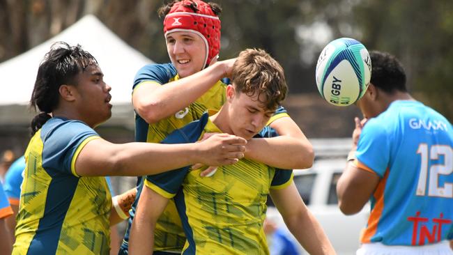 The Australian under 16 side played hard in the hot conditions. Pictures: Rugby Australia