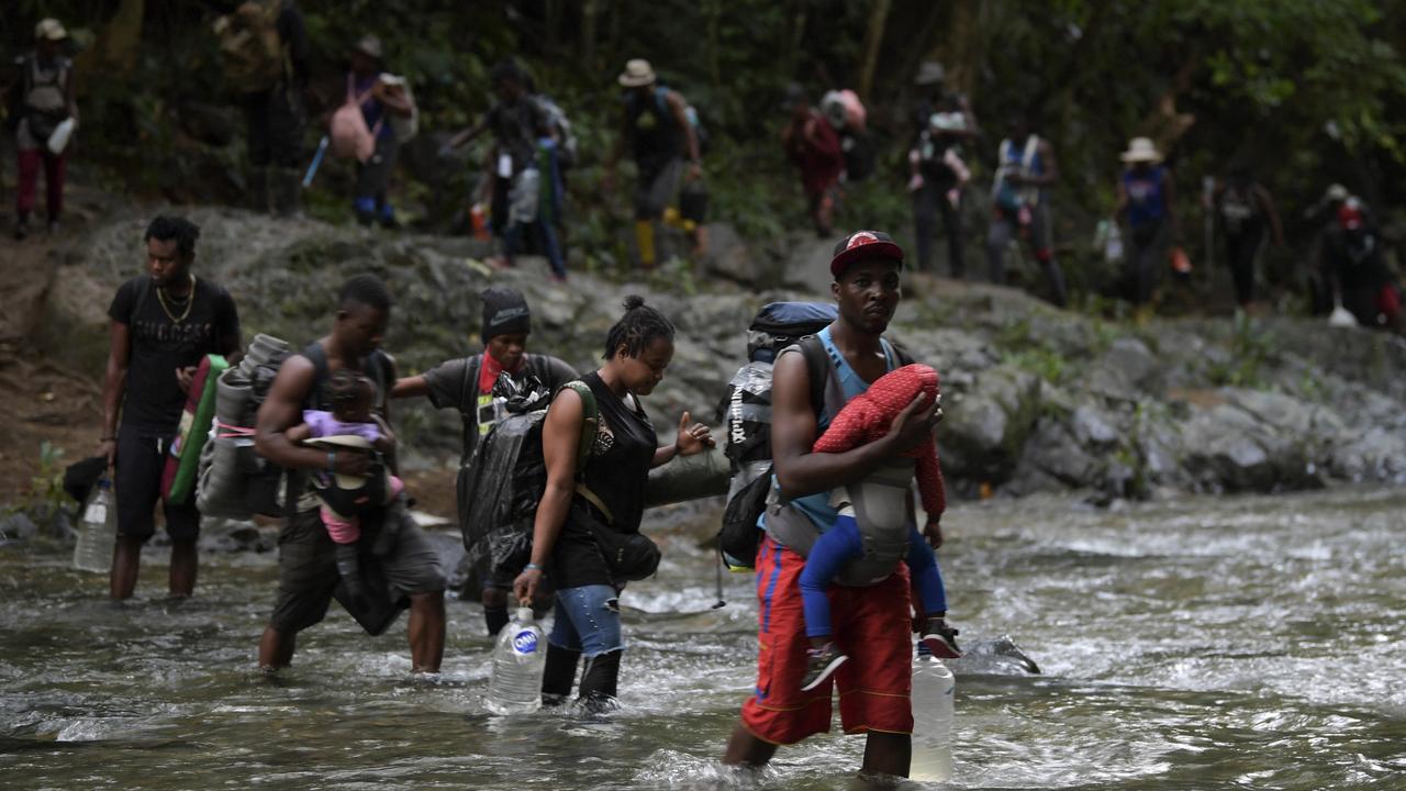 Haitian migrants cross the jungle of the Darien Gap, near Acandi, Choco department, Colombia, heading to Panama, on September 26, 2021, on their way trying to reach the US. Picture: Raul Arboleda / AFP