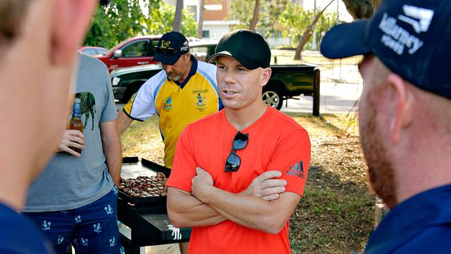 David Warner chats with Darwin Cricket Club members. Picture: Michael Franchi