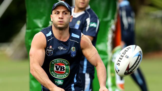 Robbie Farah passes during warm up for NSW Blue's State of Origin training at the Pacific Bay Resort,Coffs Harbour .Picture Gregg Porteous