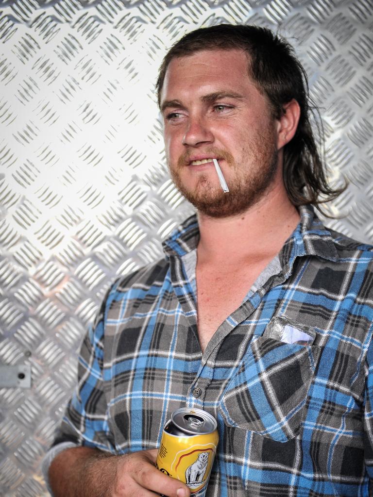 Participant Jordan Habachi is seen during Mulletfest, a special event designed to celebrate the hairstyle that's all about business at the front, party at the back, at Chelmsford Hotel in Kurri Kurri, NSW. (AAP Image/Perry Duffin) 