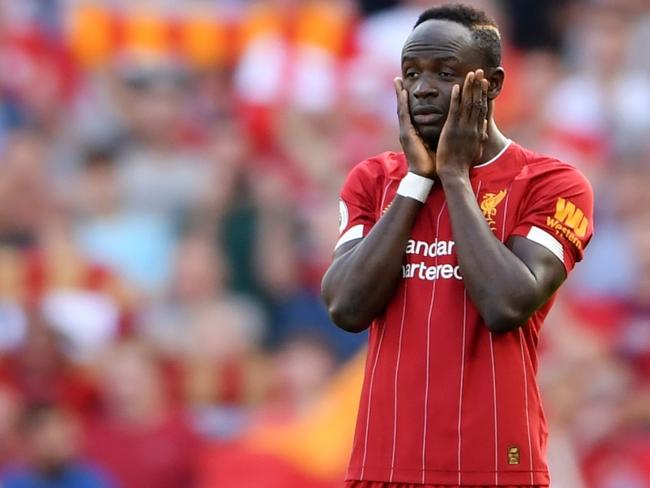 LIVERPOOL, ENGLAND - AUGUST 24: Sadio Mane of Liverpool prays before the Premier League match between Liverpool FC and Arsenal FC at Anfield on August 24, 2019 in Liverpool, United Kingdom. (Photo by Laurence Griffiths/Getty Images)