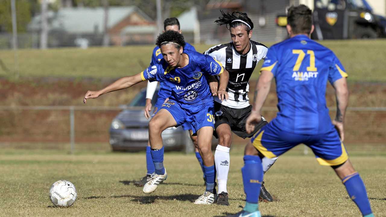 IN CONTROL: USQ FC player Kodi Bailey shields the ball. Picture: Kevin Farmer