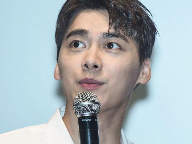 This photo taken on August 4, 2017 shows Chinese actor Li Yifeng attending an event in Hangzhou, in China's eastern Zhejiang province. - Global brands including Prada and Remi Martin have severed ties with popular Chinese actor Li Yifeng after he was detained for soliciting sex workers amid a government crackdown on the entertainment industry. (Photo by AFP) / China OUT