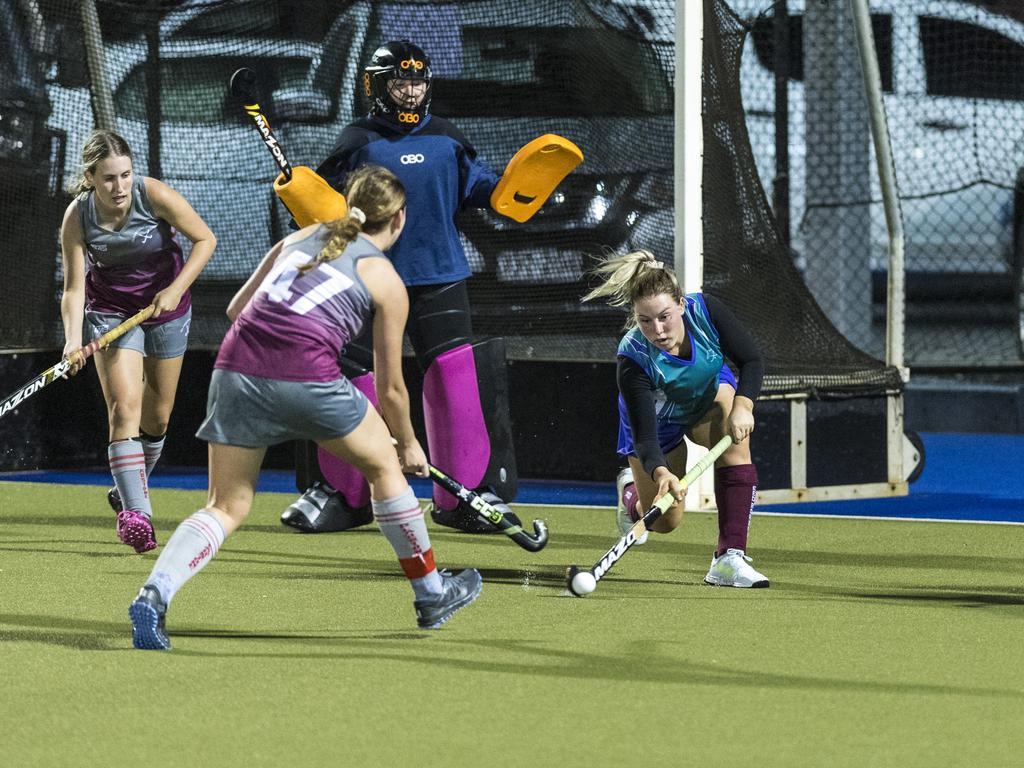 Jade Gray (right) defends for Tweed against Gladstone in Hockey Queensland Championships at Clyde Park, Saturday, May 1, 2021. Picture: Kevin Farmer
