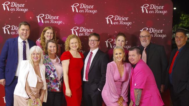 Amanda Stoker (centre in red) at the Diner en Rouge event with federal LNP MP for Bowman Henry Pike (left).