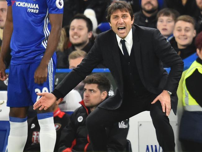 Chelsea's Italian head coach Antonio Conte gesture from the touchline.