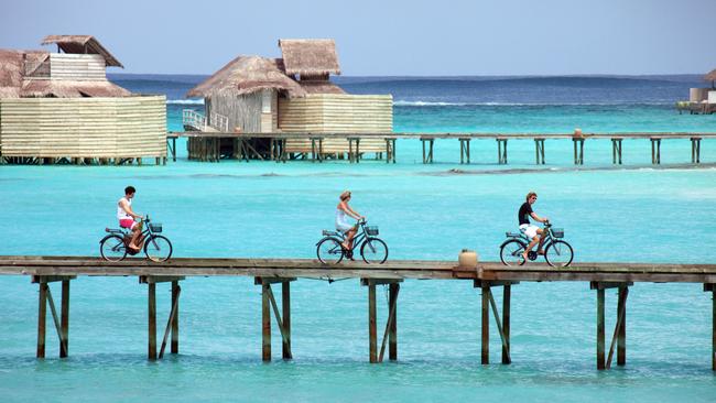 Hotel guests on Hadhdhunmathee Atoll, Laamu, Maldives.