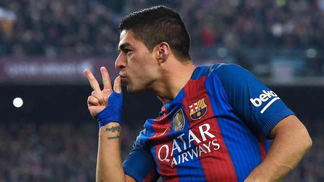 Barcelona's Uruguayan forward Luis Suarez celebrates.