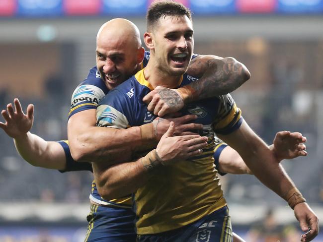 Blake Ferguson hugs Ryan Matterson after Matterson scores a try in the 67th minute of the match against the Penrith Panthers at Bankwest Stadium. Picture: Mark Kolbe/Getty Images