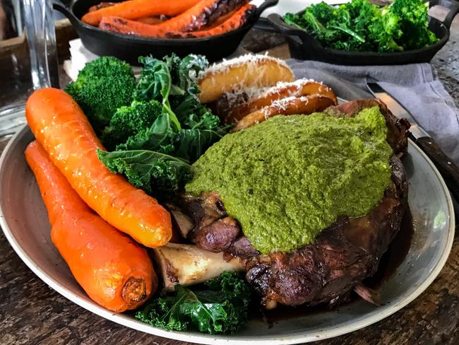 Lamb shoulder (for two) with salsa verde, carrots and greens. Picture: Jenifer Jagielski