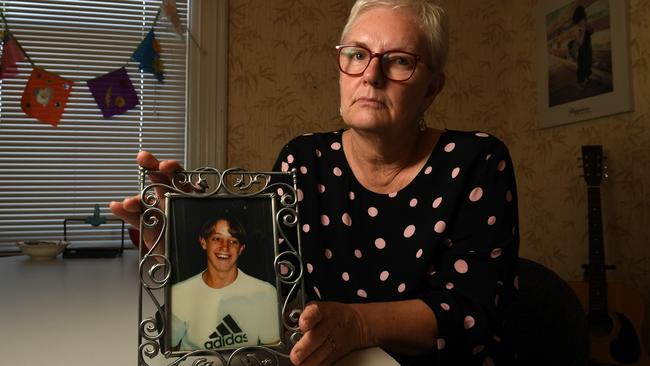 <b>Jill Chapman holds a photo of her son Michael Chapman taken on his 15th birthday. Picture: Tricia Watkinso</b>n