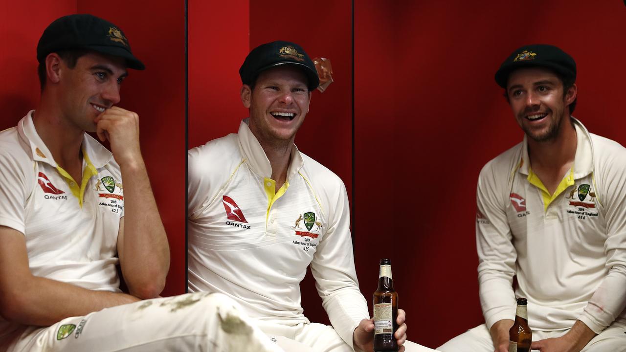 (L-R) Pat Cummins, Steve Smith, Travis Head celebrate in the change rooms after Australia claimed victory to retain the Ashes. Picture: Ryan Pierse/Getty Images