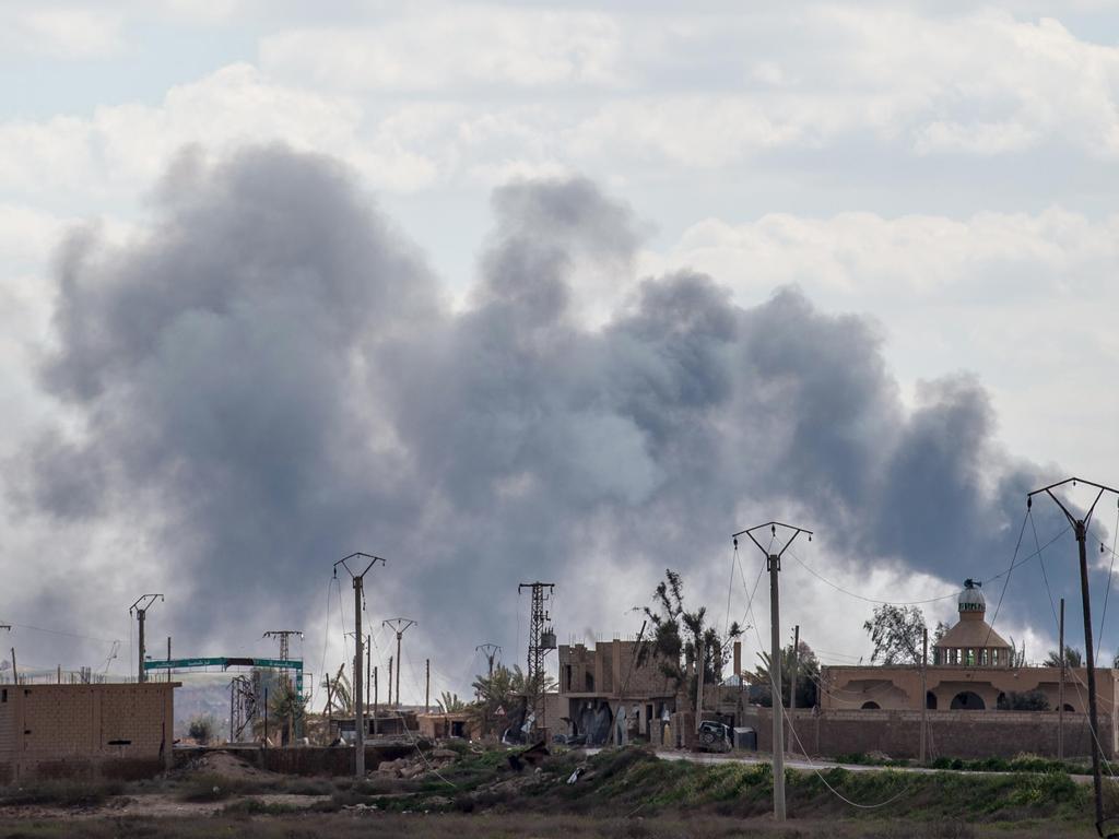 Smoke billows after shelling on the ISIS group's last holdout of Baghouz, in eastern Syria. Picture: AFP