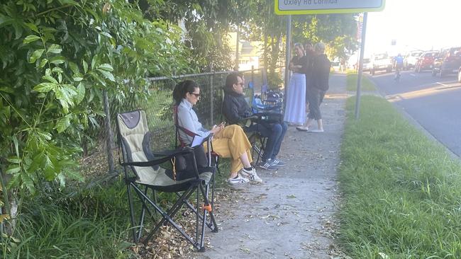 Parents queue to enrol at Sherwood State School.