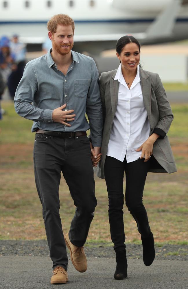 Prince Harry, Duke of Sussex and Meghan, Duchess of Sussex arrive at Dubbo Airport on October 17, 2018. Picture: Getty