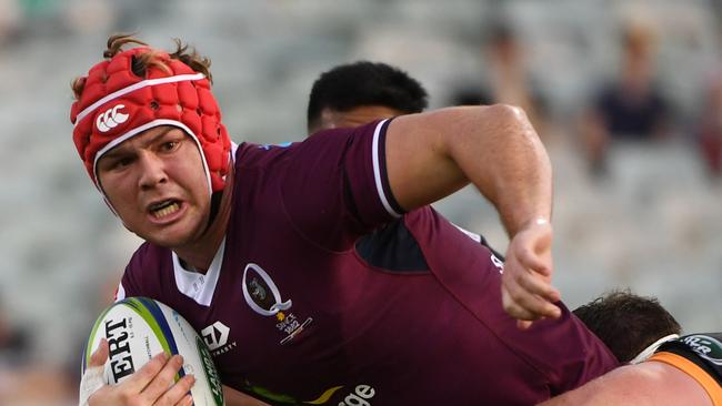 Harry Wilson tries to get through the Brumbies defence. Picture: Tracey Nearmy/Getty Images