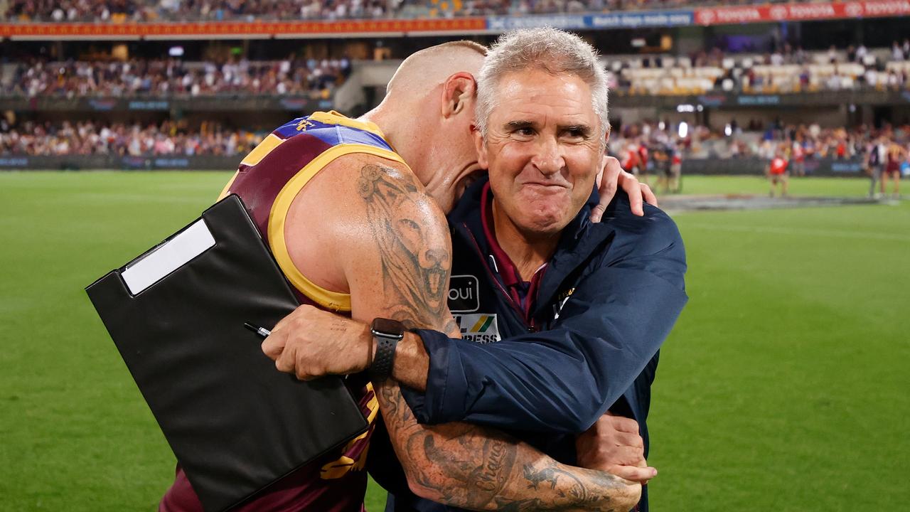 Mitch Robinson and Lions coach Chris Fagan in 2020. Photo by Michael Willson/AFL Photos via Getty Images.