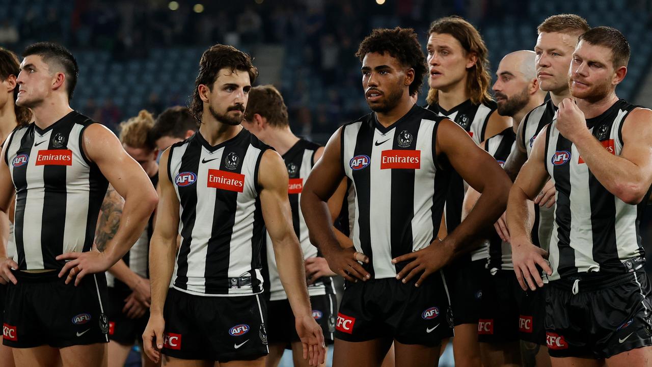 A dejected Magpies side leaves the field after a 48-point loss to the Western Bulldogs at Marvel Stadium in round 9, 2022. Craig McRae says the defeat was a ‘defining moment’ in the Pies’ rise to a flag. Picture: Michael Willson / Getty Images