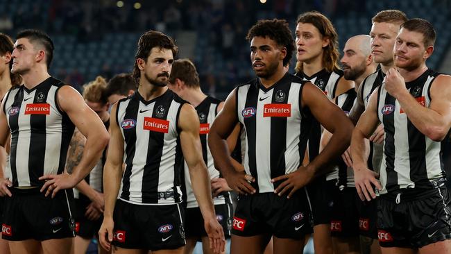 A dejected Magpies side leaves the field after a 48-point loss to the Western Bulldogs at Marvel Stadium in round 9, 2022. Craig McRae says the defeat was a ‘defining moment’ in the Pies’ rise to a flag. Picture: Michael Willson / Getty Images