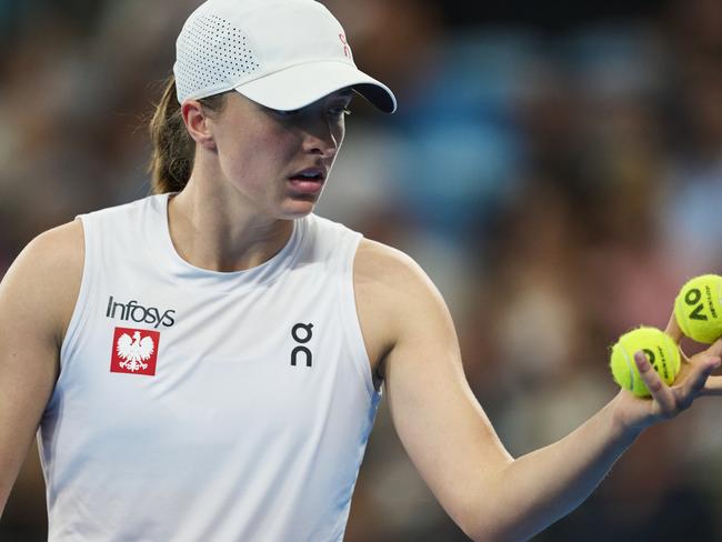 SYDNEY, AUSTRALIA - JANUARY 05: Iga Swiatek of Poland looks on in the United Cup Final against Coco Gauff of the USA during day 10 of the 2025 United Cup at Ken Rosewall Arena on January 05, 2025 in Sydney, Australia. (Photo by Brett Hemmings/Getty Images)