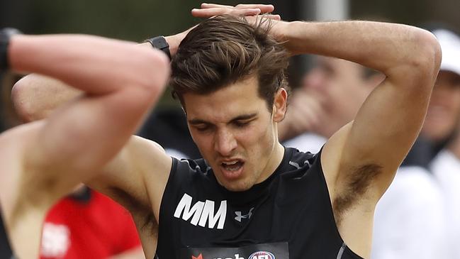 Maginness recovers after completing the 2km time trial during the 2019 AFL Draft Combine. Picture: Dylan Burns/AFL Photos/Getty Images