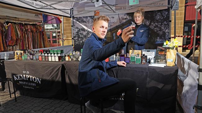 Staff from the Old Kempton Distillery Tasmania stall, Tom Reed and Tamika Schuller as they had to provide stools for patrons to sit on due to the COVID-19 restrictions. Picture: Zak Simmonds