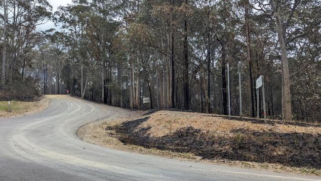 Murra River Rd was as far as reporter Tom McGann was allowed to go due to danger of fire and falling branches. Picture: Tom McGann.