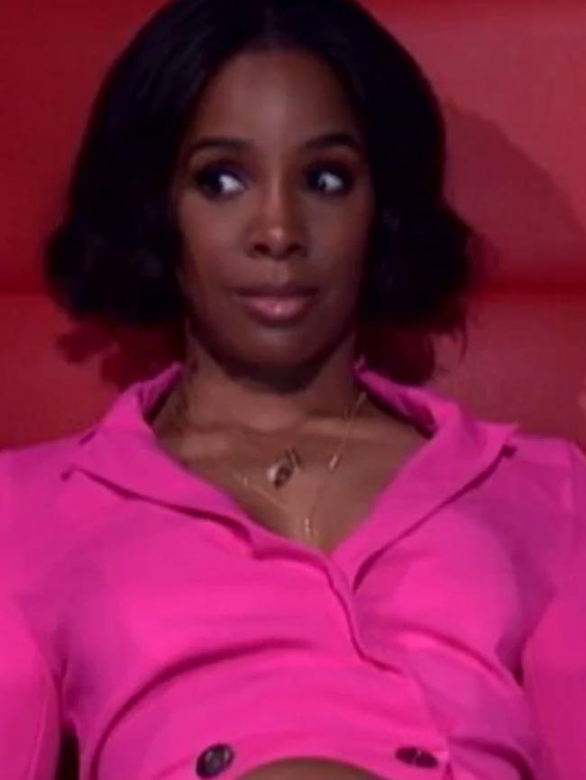 Kelly Rowland was stuck between Boy George and Seal.