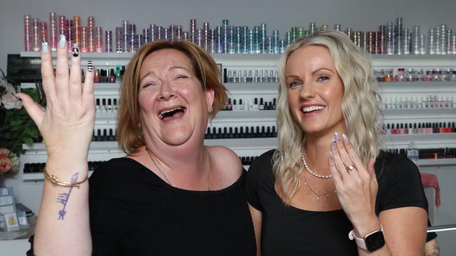 Susie Gaston from Empire Nails and Beauty says she was 'so excited' to be named as a finalist for the best nail technician on the Coast, Pictured with client Mel Moyles-Gale (R) Picture: Glenn Campbell