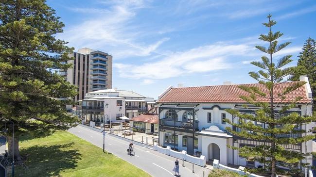 The local heritage-listed Glenelg Seawall Apartments, at far right, that would be demolished to make way for Chasecrown's $165 million apartment building. Picture: Supplied/Karen DeCean