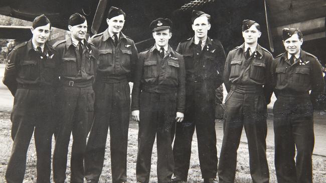 WWII veteran bomber pilot Laurie Larmer 98, flew bombers out of England including the Halifax bomber. Copy photo of Laurie Larmer with his Halifax bomber crew. Picture: David Caird.