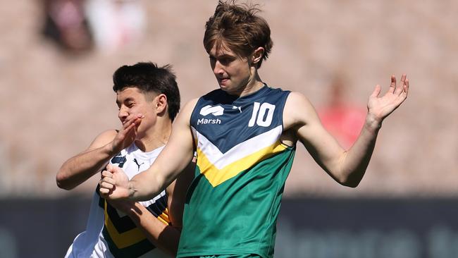 Felix Kniepp (left) puts pressure on Tom McGuane in the AFL Futures match.