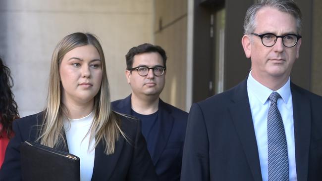 Brittany Higgins arrives at court with her partner David Sharaz (centre) and her lawyer Nicholas Owens, SC. Picture: Jeremy Piper