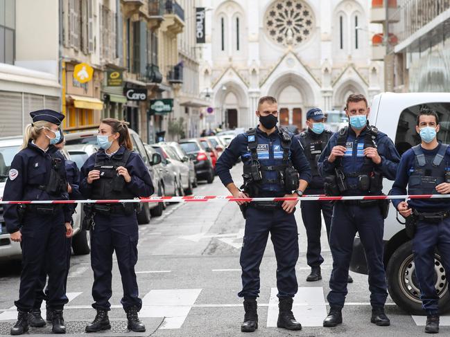 Police block the access to the Notre-Dame de l'Assomption Basilica in Nice after a knife-wielding man kills three people at the church. Picture: AFP