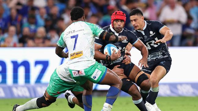 SYDNEY, AUSTRALIA - FEBRUARY 28: Langi Gleeson of the NSW Waratahs is tackled during the round three Super Rugby Pacific match between NSW Waratahs and Fijian Drua at Allianz Stadium, on February 28, 2025, in Sydney, Australia. (Photo by Cameron Spencer/Getty Images)