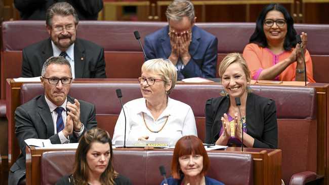 APPLAUSE: Australian Greens Senators react after the passing of the Medivac Bill in the Senate chamber at Parliament House in Canberra, on Wednesday. Picture: AAP/LUKAS COCH