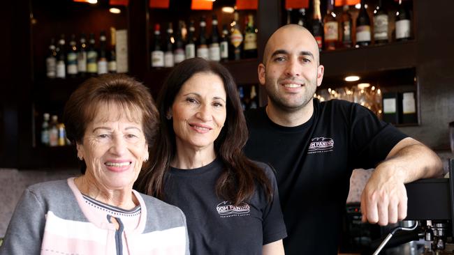 Domenico Ruggeri owner of Dom Panino on Marion Street in Leichhardt pictured at his cafe with his nonna Maria Restuccia and mum Serafina Ruggeri. Picture: Damian Shaw