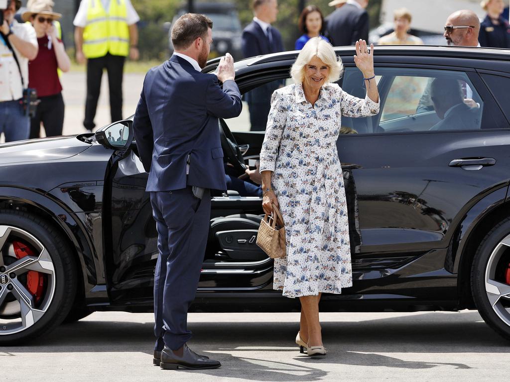 Queen Camilla waves to people gathered to farewell the royal couple after their whirlwind tour. Picture: Sam Ruttyn