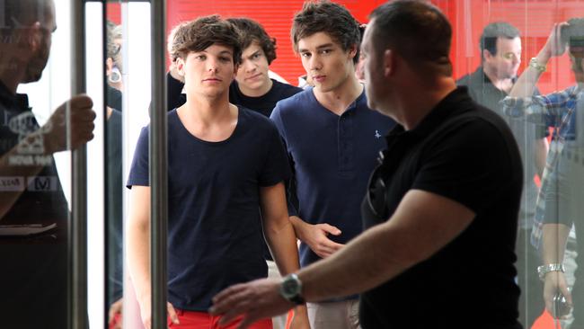 Hanging on the road with One Direction on their Sydney promo visit in April 2012, leaving Nova radio station. Picture: Toby Zerna