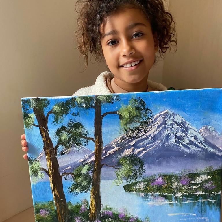 North West with her artwork.