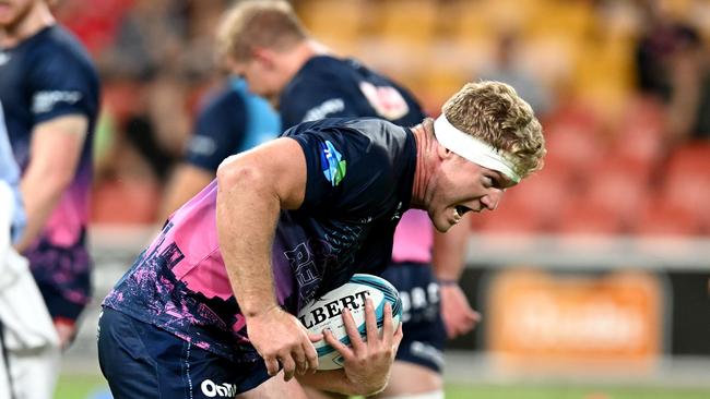 Matt Philip of the Rebels runs with the ball during the warm-up before the round one Super Rugby Pacific match between the Queensland Reds and the Melbourne Rebels at Suncorp Stadium on February 19, 2022 in Brisbane, Australia.