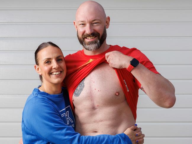 DAILY TELEGRAPH JULY 3, 2023Fitness fanatic Rob Hodgson needed a heart transplant in 2022, two years after he caught Covid on a work trip to the USA. His wife Amanda has been his carer through the ordeal.  Picture: David Swift