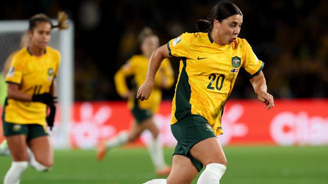 Sam Kerr of Australia runs with the ball