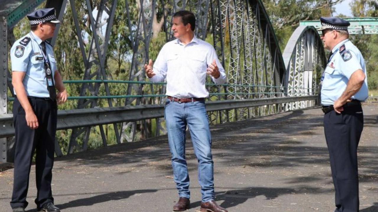 Discussing the border are (from left) Queensland Police Superintendent Mark Kelly (left) Goondiwindi Mayor Lawrence Springborg and Assistant Commissioner Mike Condon at Goondiwindi's old Macintyre Bridge.