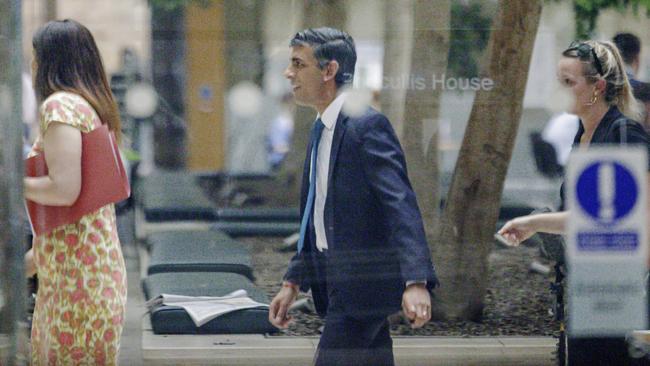 Rishi Sunak (centre) is seen in Parliament overnight (AEST). Picture: Getty Images