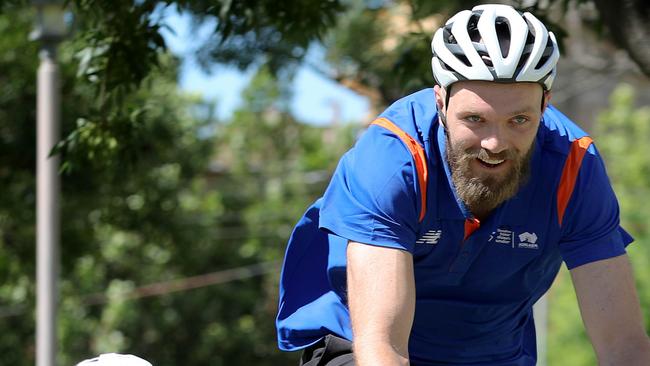 Presser to launch TDU Village of Cycling in Vic Square. Melbourne Demons star, Max Gawn is the ambassador for the Tour Down Under. Paddy Crowe, 7, got to see what it was like riding against the star footballer. 8 November 2022. Picture Dean Martin