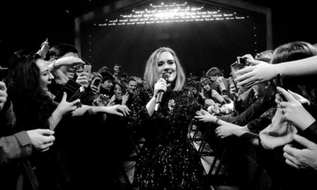 Adele shares behind the scenes snaps