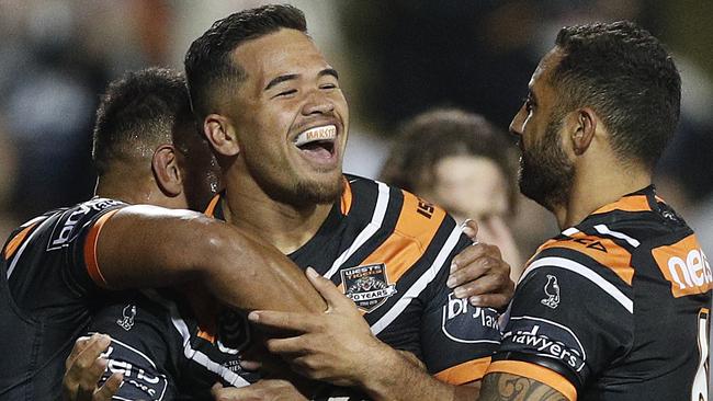 Esan Marsters celebrates a try against the Cowboys.